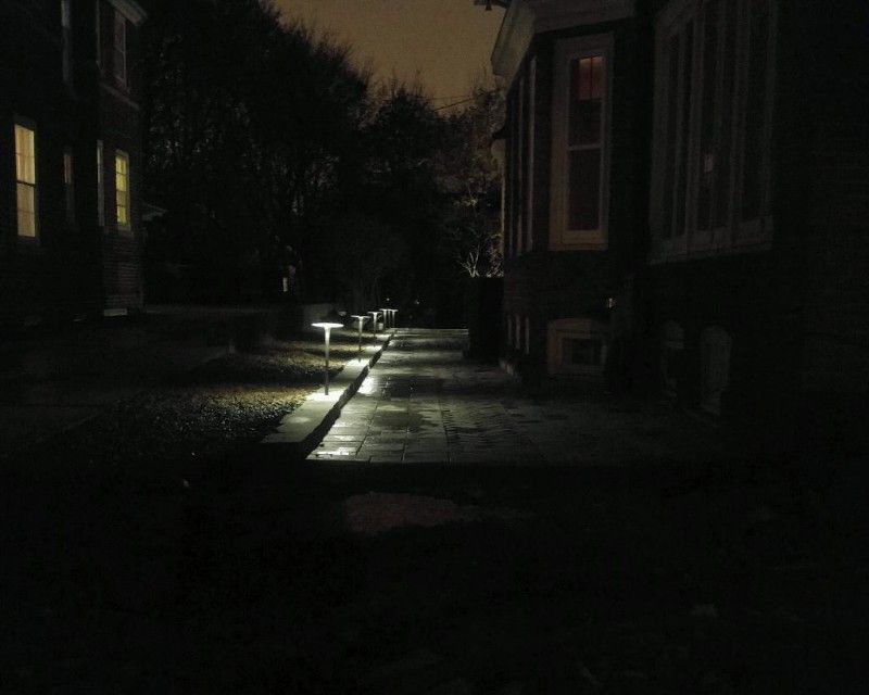 Evening_picture_of_finished_Richcliff_patio_with_Town_Hall_paver_inlay-140-1500-800-80d